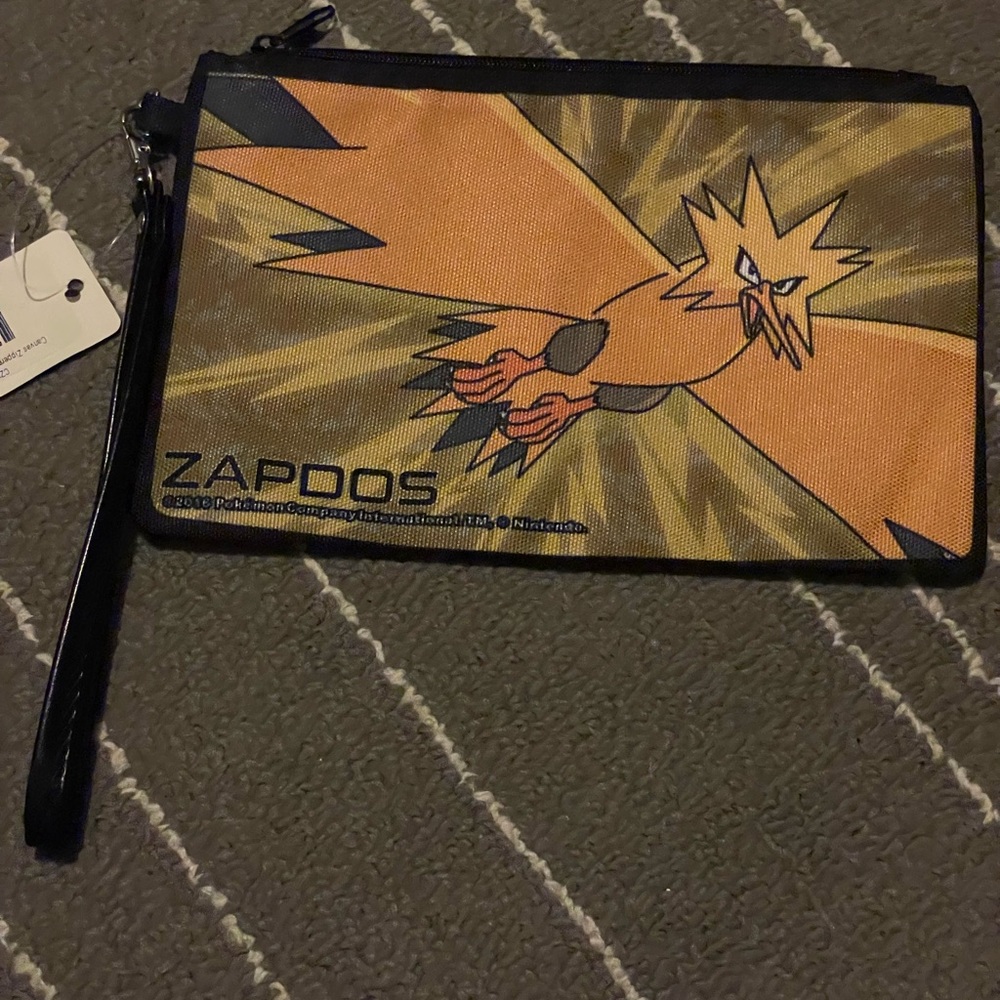 Pokemon zapdos wristlet brand new